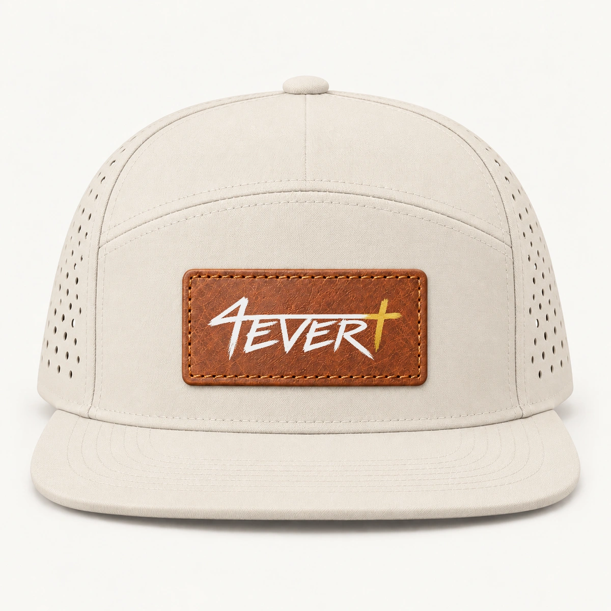 Off-white/Cream — Flat-bill snapback with a centered brown stitched patch carrying the original white Forever wordmark and gold Christian cross; studio design preview